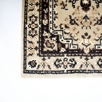Vintage tapijt/deurmat crème