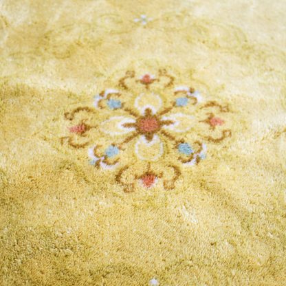 Vintage tapijt geel ovaal
