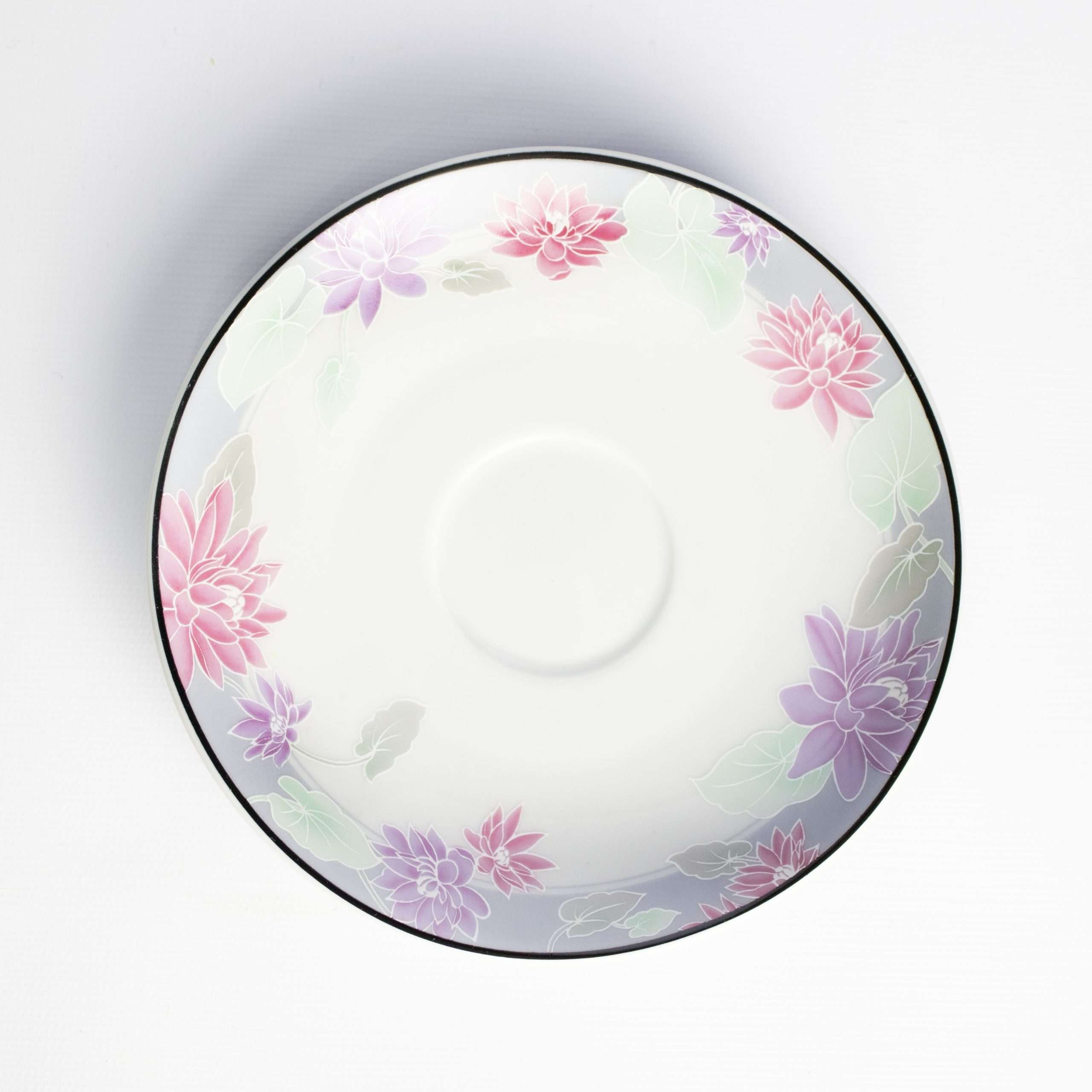 Vintage kop en schotel bloemen